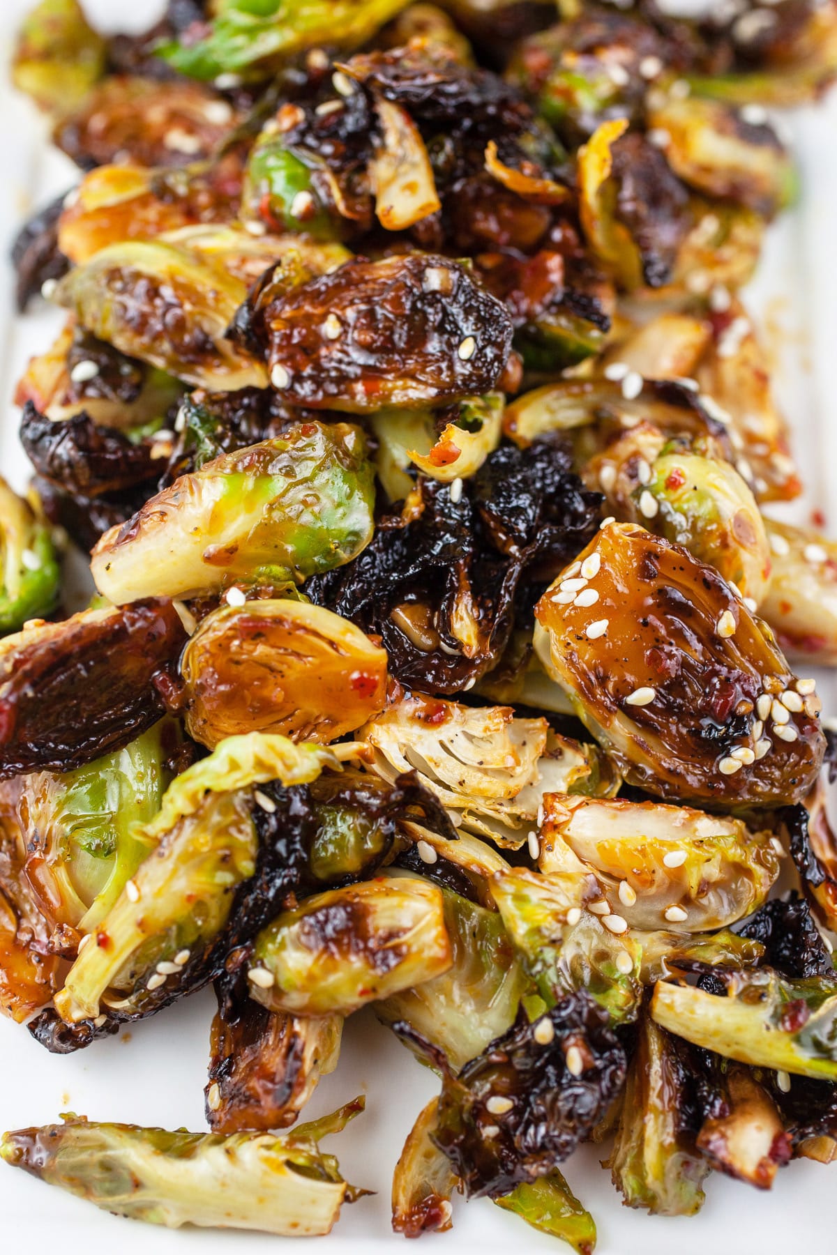 https://www.therusticfoodie.com/wp-content/uploads/2023/07/Sweet-and-Spicy-Roasted-Brussels-Sprouts-redo-9.jpg